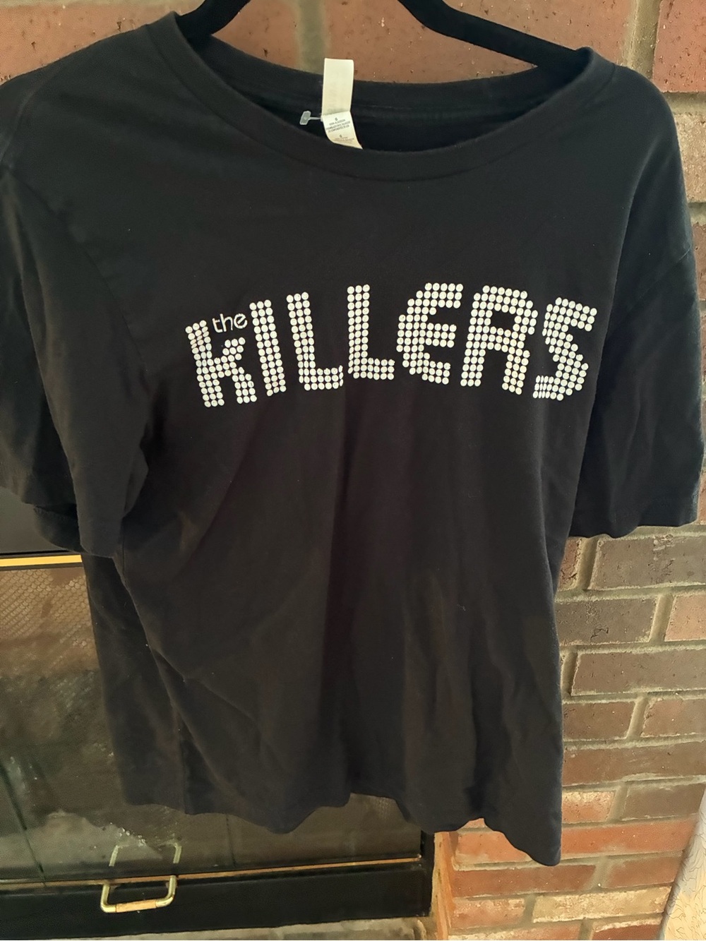 This is an official licensed The Killers "Dots Logo" black band t-shirt Large
